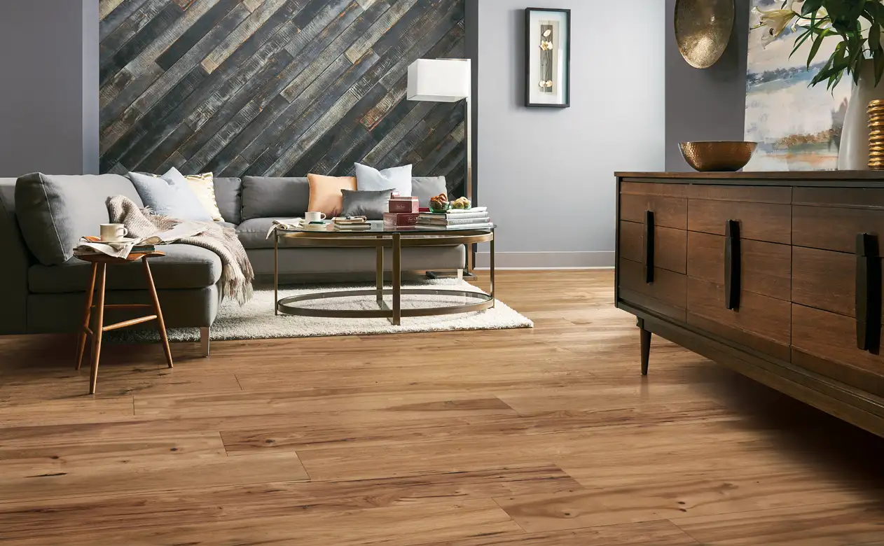 Medium oak hardwood floor living room grey accent wall panels 